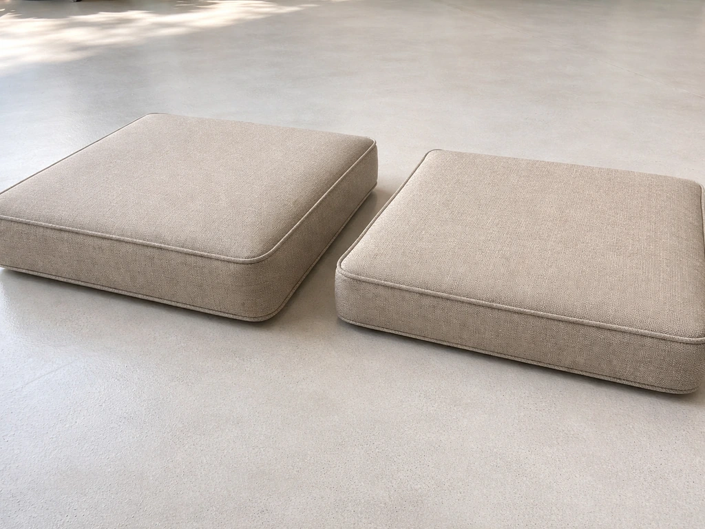Side-by-side outdoor cushions showing thick foam and UV fabric versus thinner budget cushion.